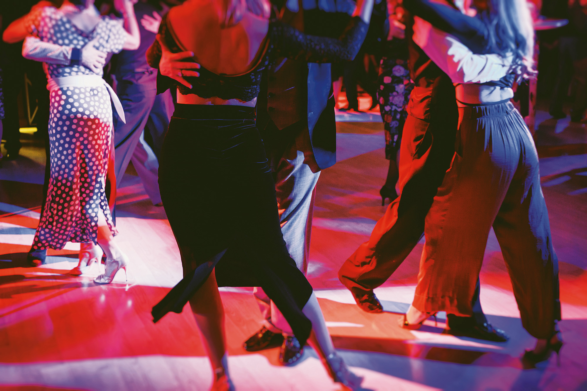 Couples dancing traditional latin argentinian dance