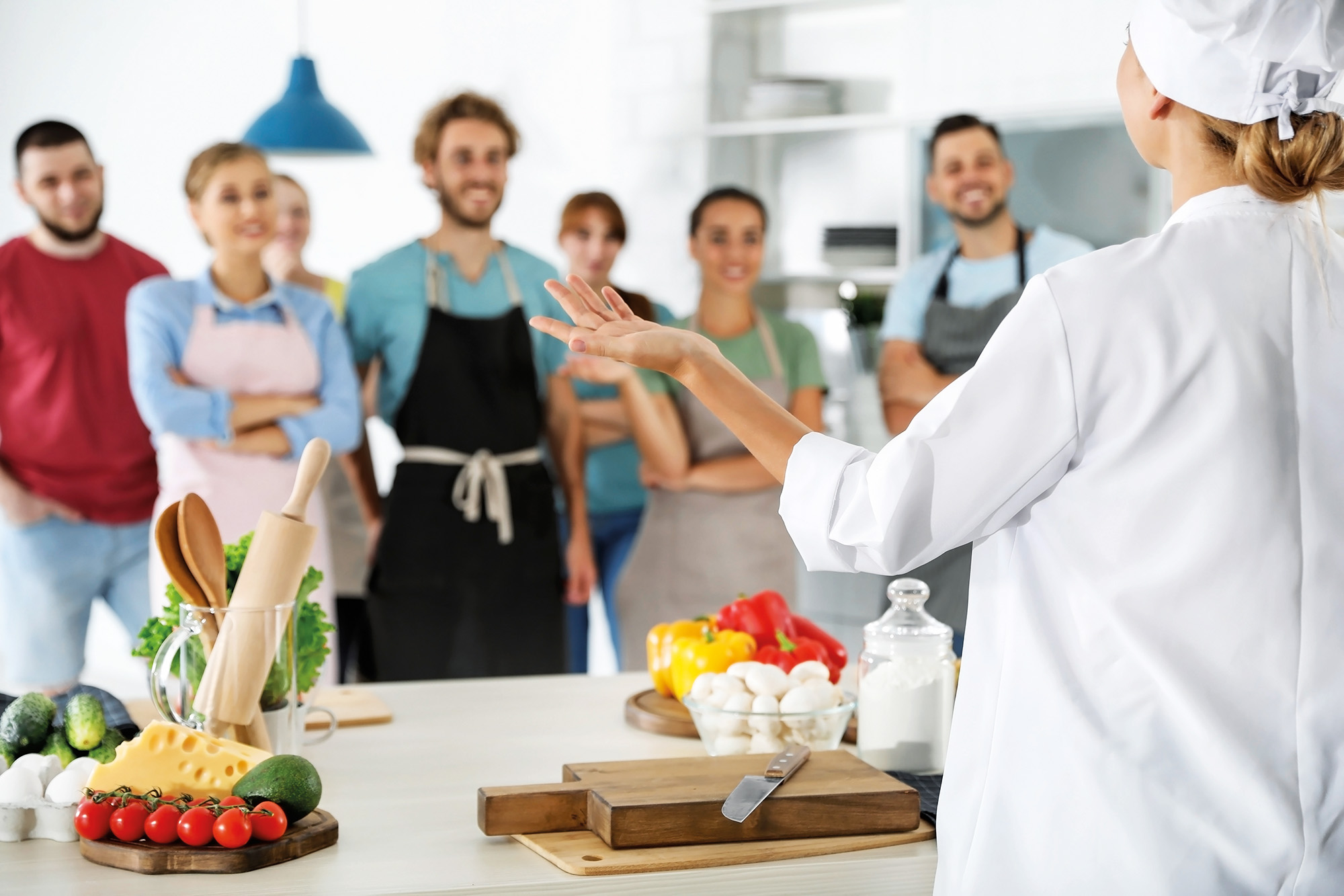 Group of people and female chef